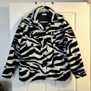Oversized Sherpa button up jacket from beginning boutique